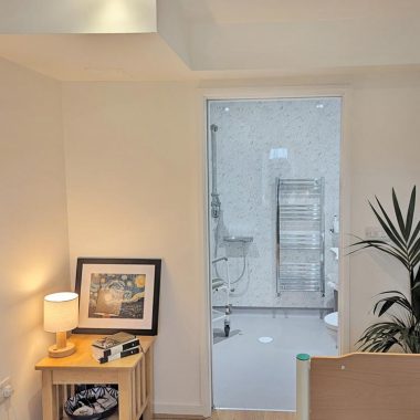 AFTER: Renovated mobility wet room and accessible bedroom