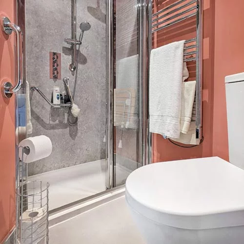 Accessible, bespoke bathroom design and renovation with walk in shower