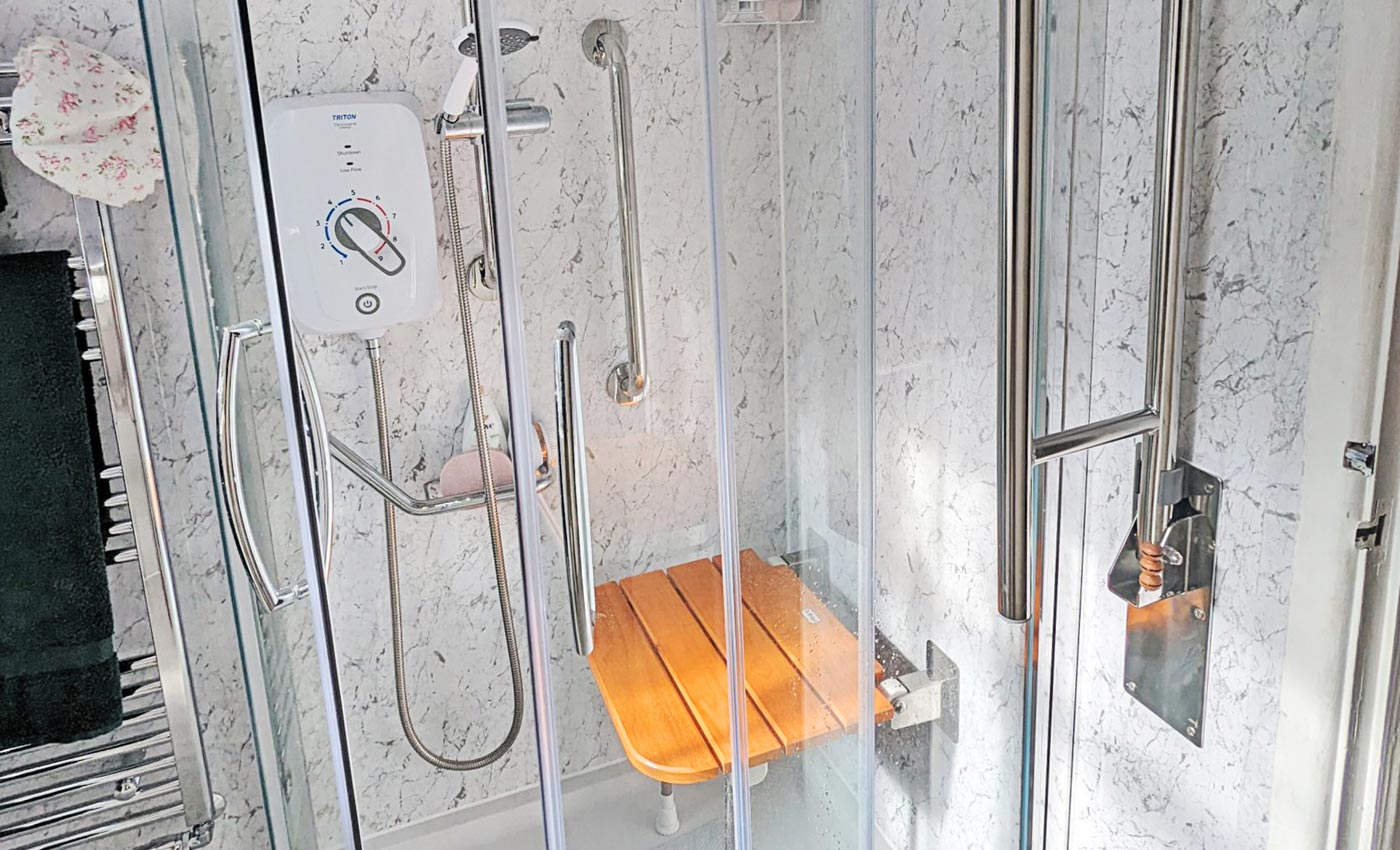 Walk-in bath with accessible shower